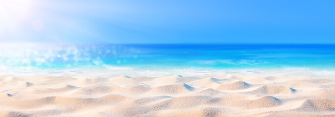 Fototapeta na wymiar Beach Background - Beautiful Sand And Sea And Sunlight 
