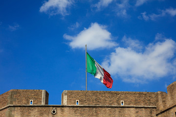 Italian flag on top of Sant Angelo castel - Rome, Italy