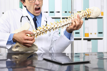 crazy doctor with the spine skeleton pretends to play the guitar