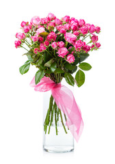 Bouquet of pink roses in glass vase