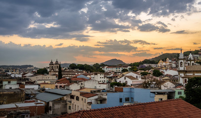 Street view of Sao Joao del Rei with Nossa Senhora do Carmo Church on backgound - Sao Joao Del Rei, Minas Gerais, Brazil