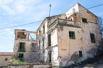Fototapeta na wymiar Old abandoned house, left and broken - Stock image