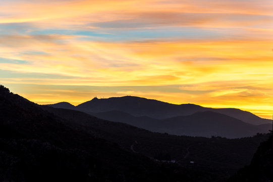 Idyllic view of sunset in the mountains on a day in March, captured in Moclín, Andalusia, Spain