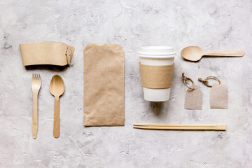 breakfast take away with paper bags on white table background top view mock up