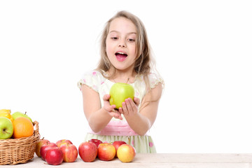 Fototapeta na wymiar child, cute baby happy girl with colorful fruits in basket