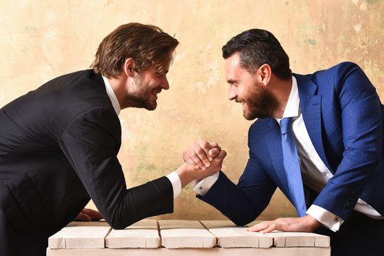 Challenge Concept. Businessmen Arm Wrestling.