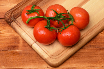 healthy lifestyle, vegetarianism , diet and fitness, red tomatoes vine