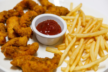 fish fingers with chips and sauce