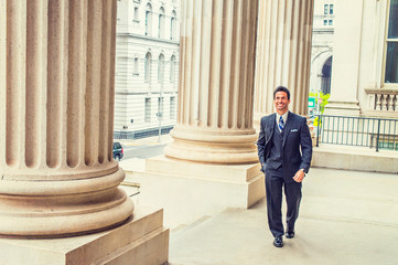 Middle Age American Businessman walking to work inside vintage office building in New York