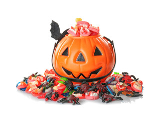 Decorated pumpkin basket with sweet jelly treats