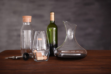 Obraz na płótnie Canvas Glass carafe of wine on table against blurred background