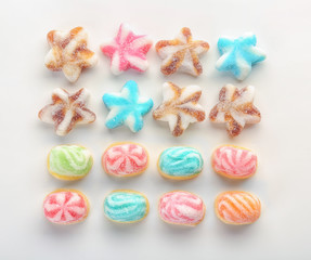 Tasty jelly candies on white background