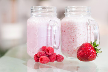 Refreshing milk smoothie with scattered berries