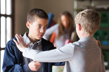 Students fighting indoors