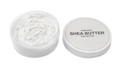 Jar of shea butter on white background