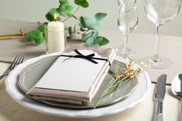 Beautiful table setting with silver flatware
