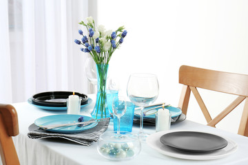 Beautiful table setting with silver cutlery