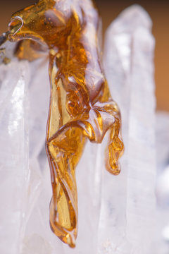 Macro detail of melted cannabis oil concentrate aka shatter