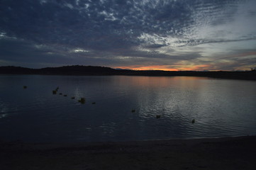 Kayak on the lake at sunset