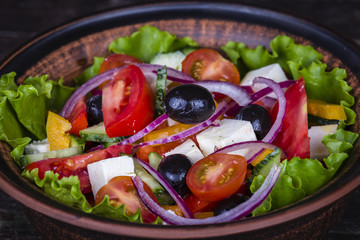 Fresh vegetable greek salad on the table