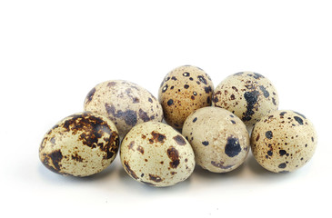 fresh quail eggs isolated on white background