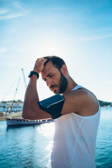 Confident man with armband