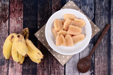 Boiled banana in syrup and wholes of banana.
