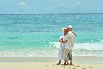 Elderly couple rest at tropical resort