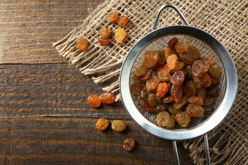 Raisins in a metal sieve