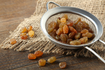 Raisins in a metal sieve