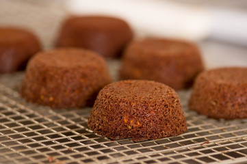 Delicious chocolate cake in a grating bakery