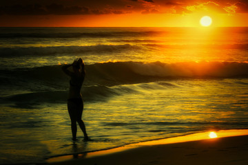 Silhouetted Girl Preparing For Last Swim Of Summer