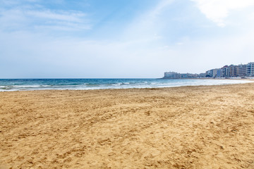 Empty beach of the sea in the spring.