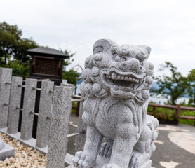 Fototapeta na wymiar Lion statue in temple