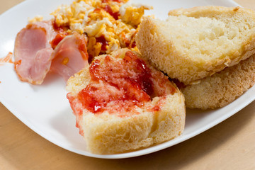 Strawberry jam on homemade bread