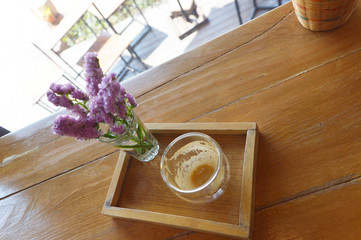 empty hot espresso coffee in the wooden tray