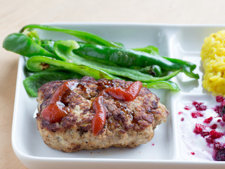 Japanese cuisine, homemade meatloaf and fried green peppers