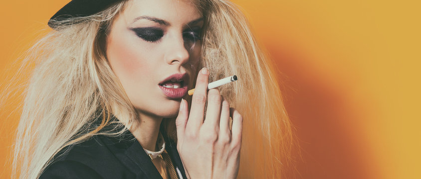 Boho beautiful girl portrait wearing hat and smoking cigarette, letterbox