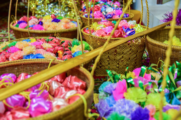 colorful ribbons flower green,pink,blue and orange for background.