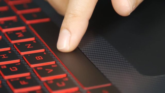 close up of a finger pressing space bar button on a keyboard, Laptop Keyboard