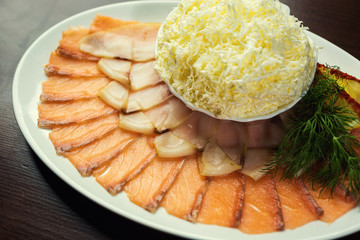 Thin Sliced Salmon Sashimi Served ,sliced salted fish on a plate,red fish, sliced thin slices,Thinly sliced oily fish on a plate,Fish cut