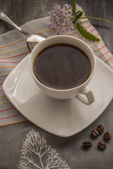 coffee on a gray table .