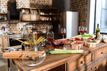 pizza, wine and vegetables ready for party