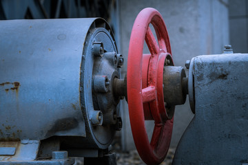 exterior view of machine with valve and gear,closeup.