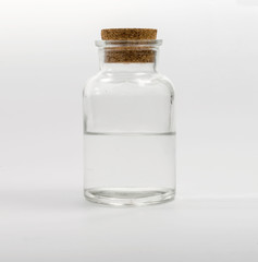 Glass jar with water closed stopper