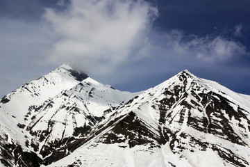 Mountain snow landscape, peak and hill in winter time in Gudauri, Georgia