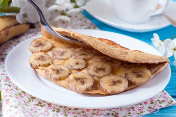 Pancake from oatmeal with banana and cheese, healthy breakfast