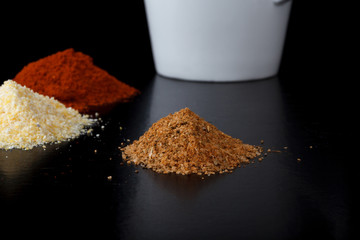 Spices, chocolate and white ceramic mug 