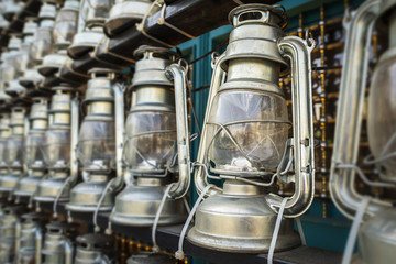 Decorative kerosene lamps in front of a mosque, as a symbol of religious mourning of Imam Husayn...