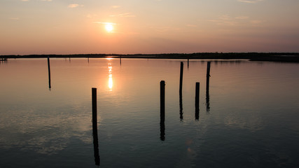 Fototapeta na wymiar laguna di Bibione al tramonto